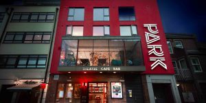 Park Theatre Building, Park logo on the side of the building and a large window on the second floor of the building, underneath the window it says Theatre, Cafe and Bar
