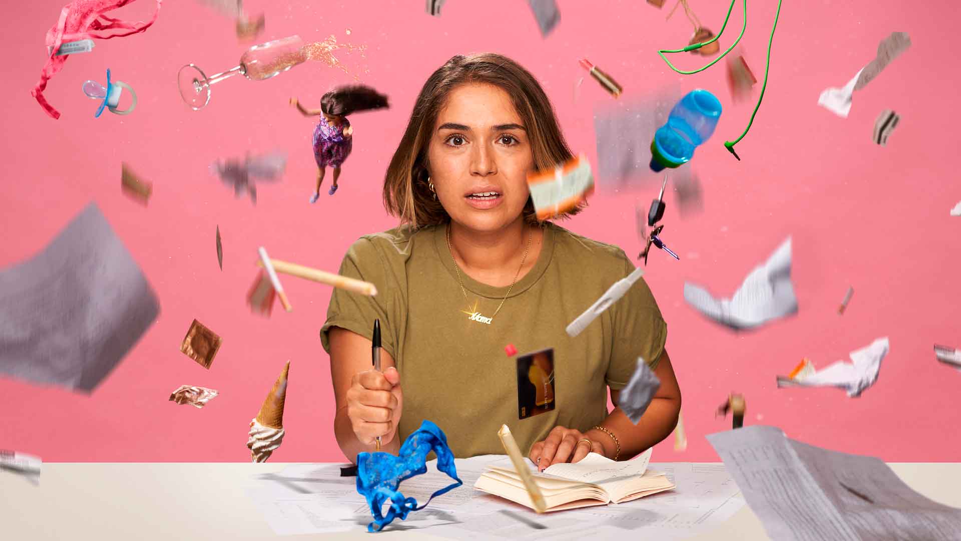 A woman looks distressed, holding a notebook and pen while various objects rain down around her.