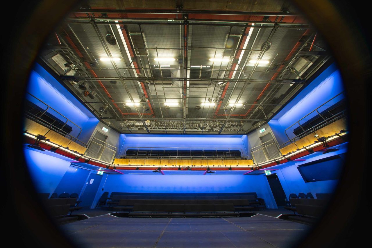 A circular fish eye perspective of the Park 200 Theatre Space with no audience