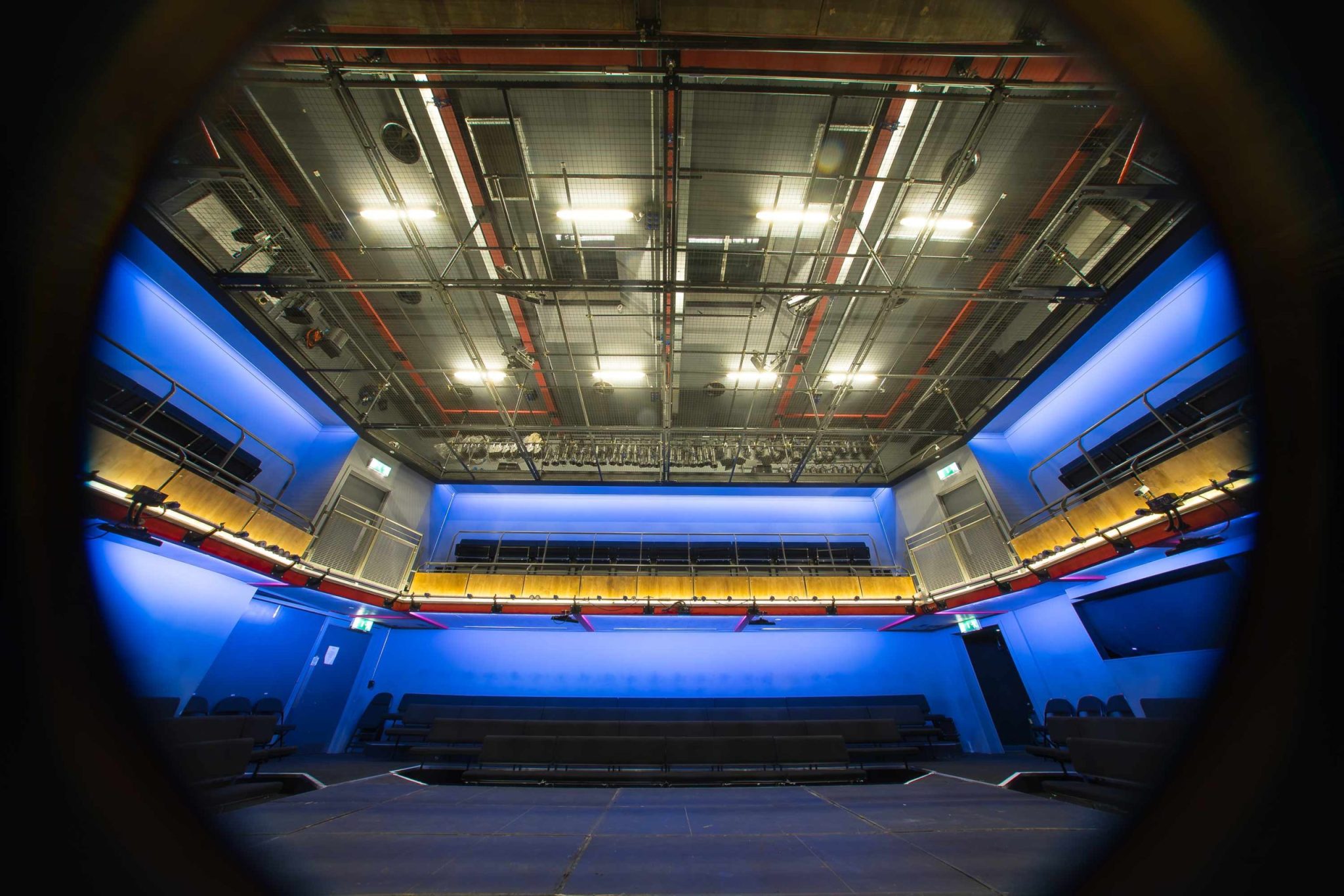A circular fish eye perspective of the Park 200 Theatre Space with no audience
