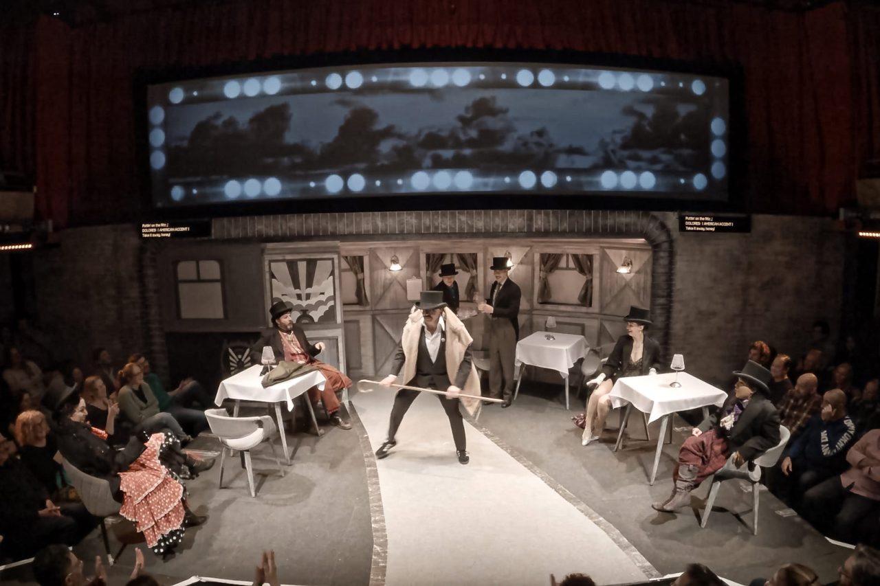 A captioned performance of Whodunnit [Unrehearsed] 3