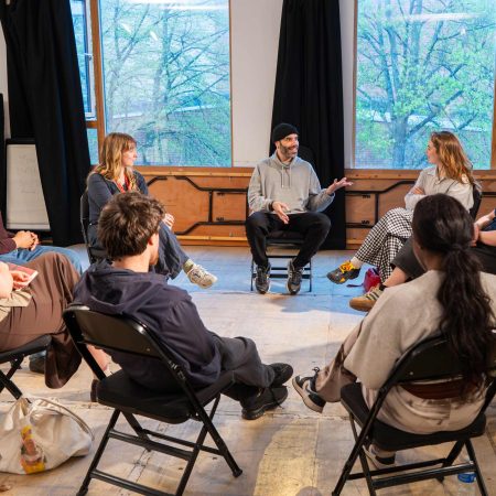 Morris Space, with a group of young adults sitting on chairs chatting