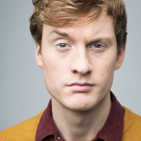 A headshot of comedian James Acaster.